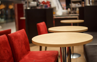 part of a circular table in a coffee bar