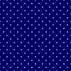 Tile vector pattern with white polka dots on blue background © ingalinder