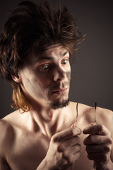 man surprised charred wires