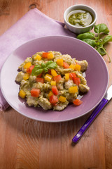 stew chicken with pesto sauce capsicum and tomato