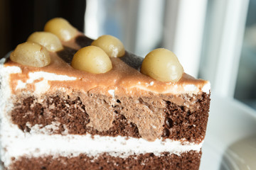 chocolate cake with Macadamia on top