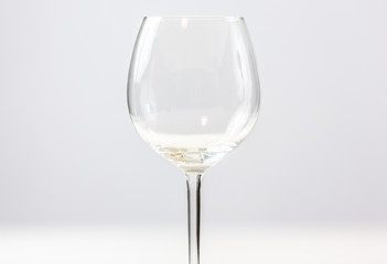 Large empty modern red wine glass