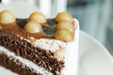 chocolate cake with Macadamia on top