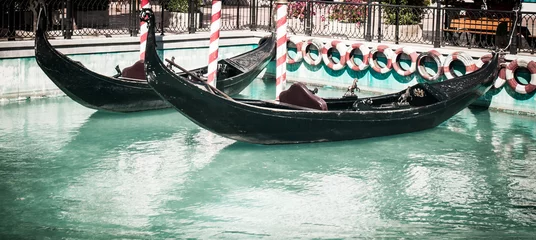 Photo sur Plexiglas Gondoles Gondolas on pool in sunny day in retro style