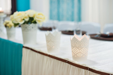 Beautifully decorated wedding table bride and groom at a restaur