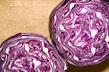 The fruit of red cabbage cut with a  knife