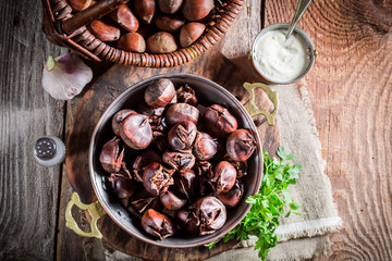 Closeup of fresh chestnuts. with garlic sauce