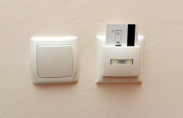 Electronic lock with card inserted and light switches