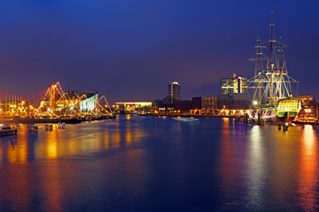 Fototapeta na wymiar The harbor from Amsterdam in the Netherlands by night