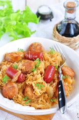Roasted sausages with stewed cabbage