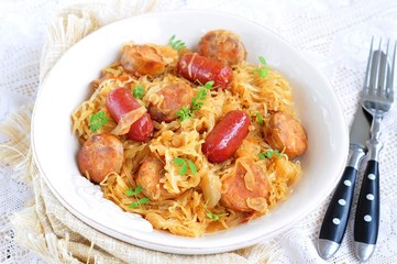 Roasted sausages with stewed cabbage