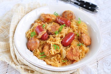Roasted sausages with stewed cabbage