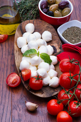 Mozzarella in wooden bowl