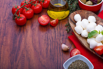 Mozzarella in wooden bowl