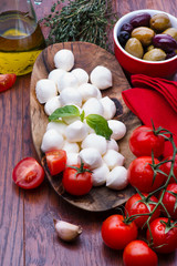 Mozzarella in wooden bowl
