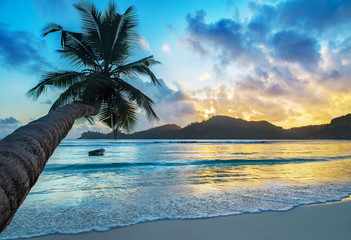 Tropical beach Baie Lazare at sunset, Mahe island, Seychelles