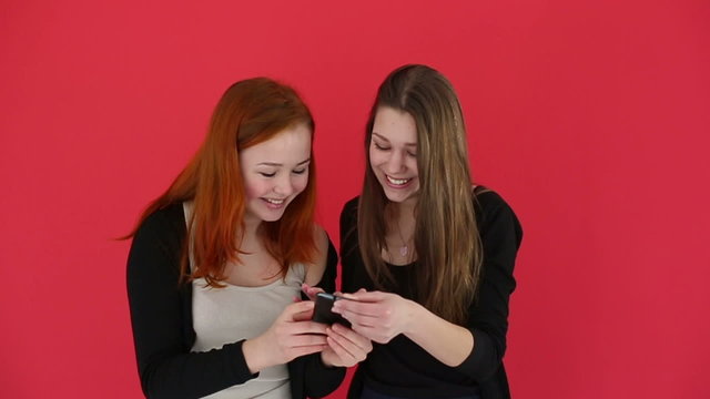 Girls a self portrait with smart phone. Slow motion