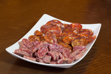 various types of spanish salami, sausage and ham.
