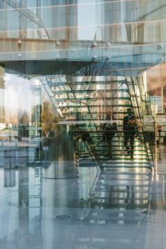 Business Couple Taking the Stairs in a Modern Building