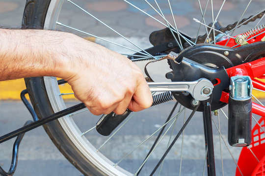 repair of a bicycle with a wrench