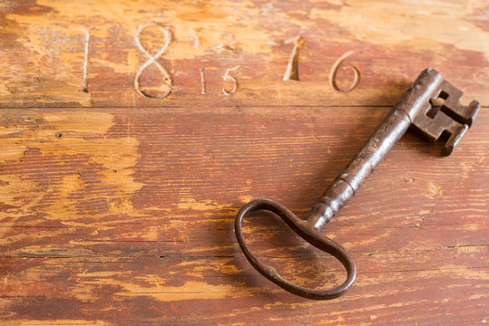 Old key on wood