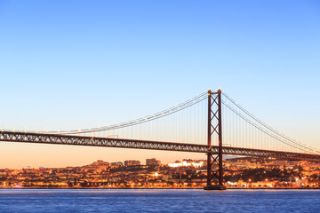 Fototapeta na wymiar Lisbon cityscape and the 25 de Abril Bridge
