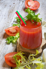 Fresh tomato juice with sliced tomatoes