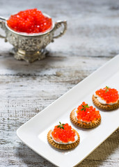 Tartlets with red salmon caviar