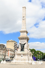 Fototapeta na wymiar Monument to the Restorers at Restauradores Square Lisbon