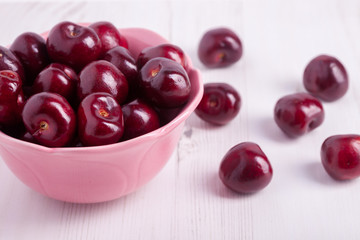 Cherries in a bowl and loose