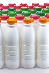 dairy products bottles with bright covers