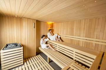 Fototapeta na wymiar Young women in sauna