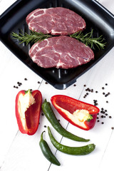 Raw pork  steak with fresh vegetable