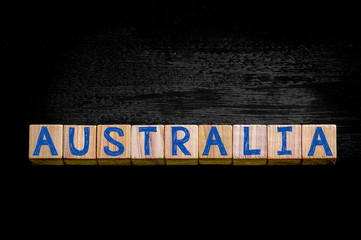 Word AUSTRALIA isolated on black background