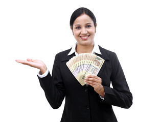 Young business woman holding Indian currency notes