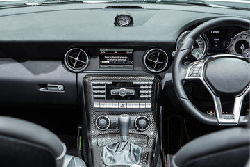 Fototapeta premium Interior of a modern automobile showing the dashboard