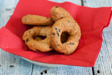 Ring crackers on old wooden table