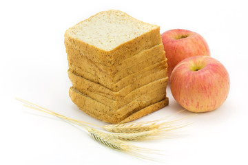 bread and apple isolated on white background,focus on bread