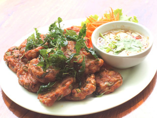 fried fish cake with cucumber sauce