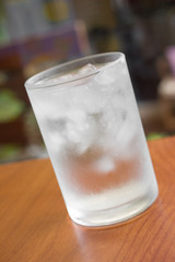 A glass of water with ice.