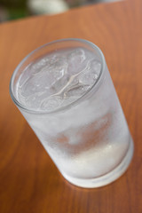 A glass of water with ice.
