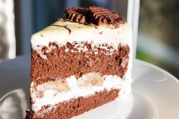 chocolate cake with cream and banana