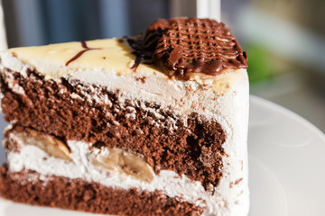 chocolate cake with cream and banana