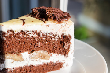 chocolate cake with cream and banana