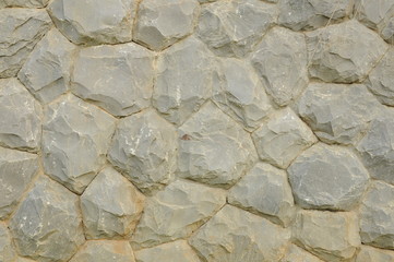 Part of a gray stone wall, for background or texture