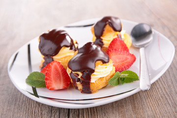 choux pastry with cream and chocolate