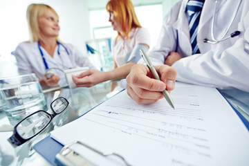 Doctor writing