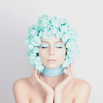 Young woman with blue flowers hair