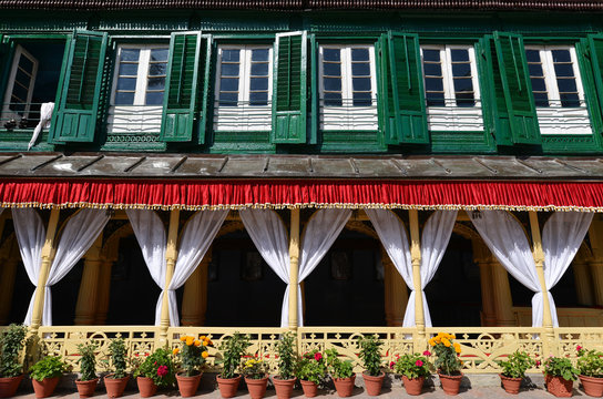 King palace with green shutters and flower pots. Durbar square, - Powered by Adobe