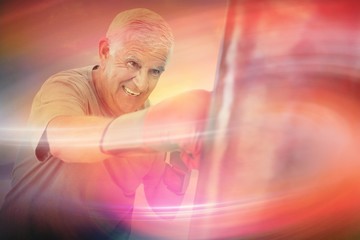 Composite image of portrait of a determined senior boxer